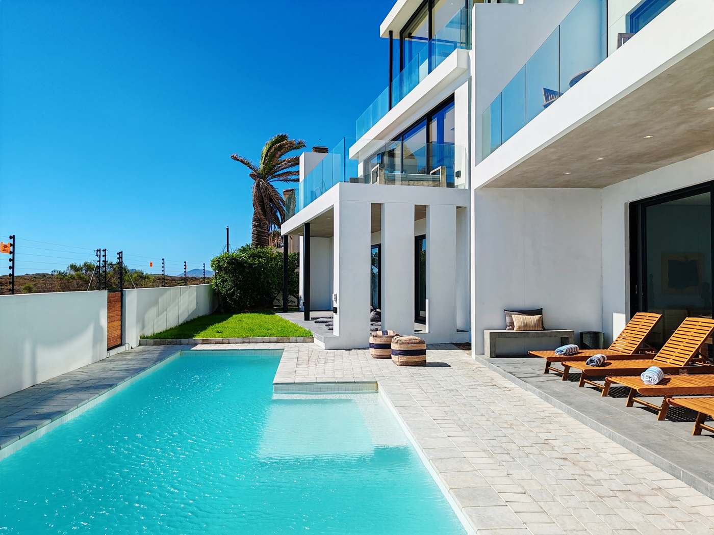 Drift Sunset Beach House — modern beachfront villa with private pool in Sunset Beach, Cape Town