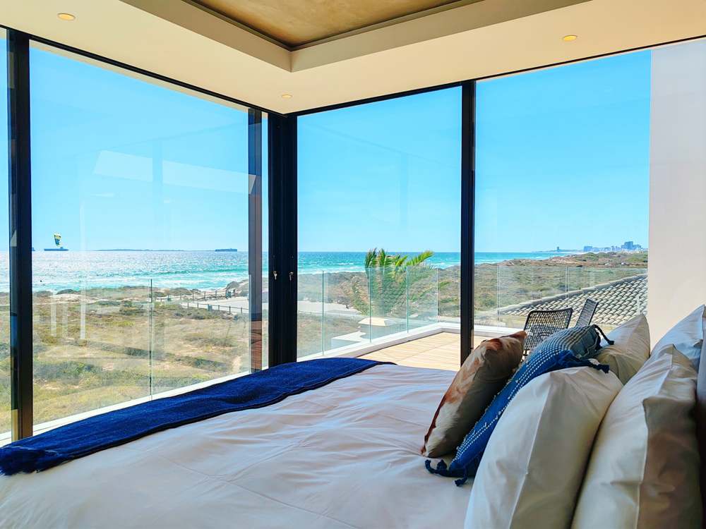 Ocean-view window seat at Drift Sunset Beach House overlooking the Atlantic